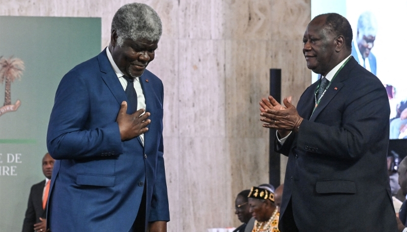 Ivory Coast President Alassane Ouattara (right) and his PM Robert Beugré Mambé in Abidjan, 13 February 2024.