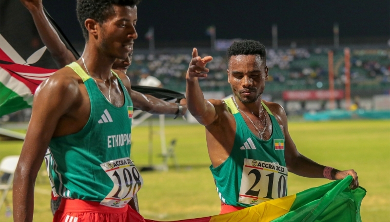 Samuel Firewu Fiche and Simon Kiprop, two Ethiopian athletes, after the men's 3,000 m at the 13th All-Africa Games in Accra, Ghana, on 18 March 2024.