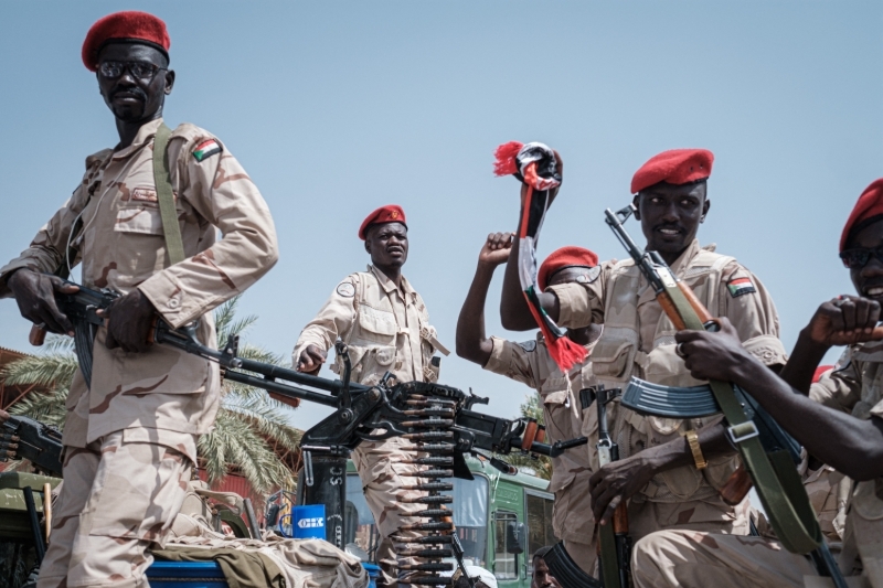 Members of the RSF stand guard during one of General Hemeti's rallies in Khartoum on 18 June 2019.