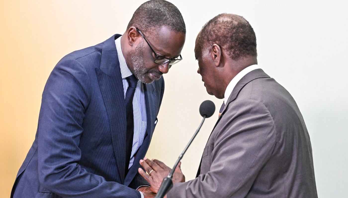 Tidjane Thiam (left) and Alassane Ouattara after meeting at the Presidential Palace in Abidjan, 11 March 2024.