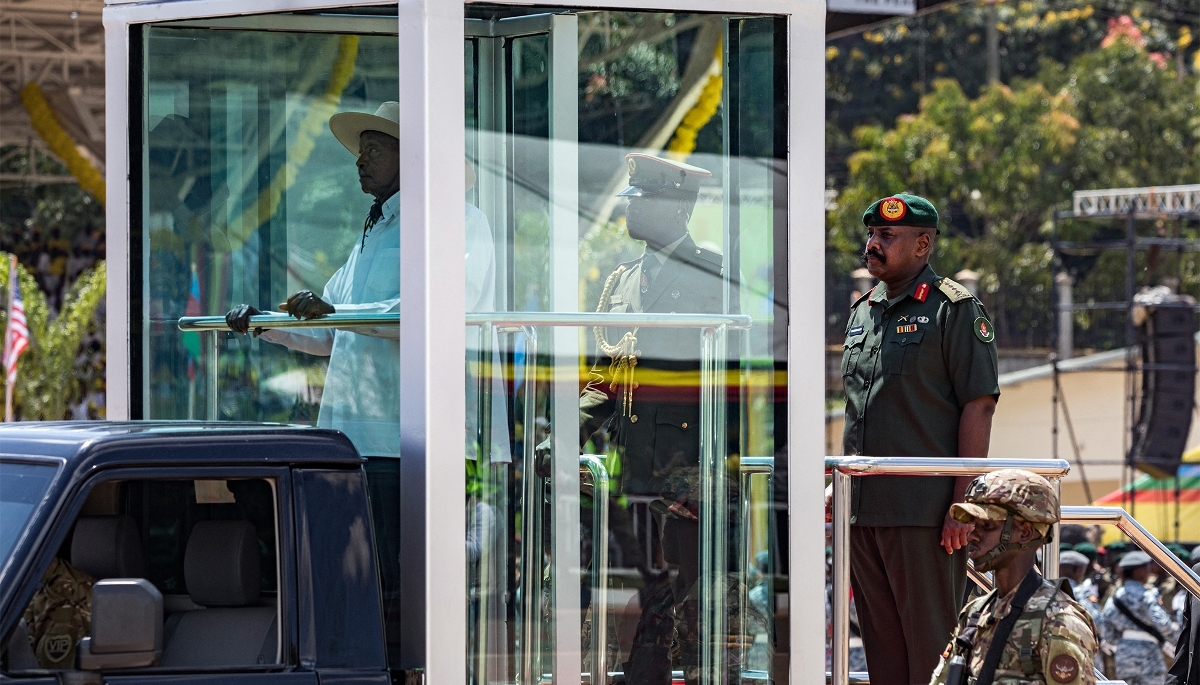 President Yoweri Museveni (left) and his eldest son, Muhoozi Kainerugaba (right), in Kampala on 12 May 2026.
