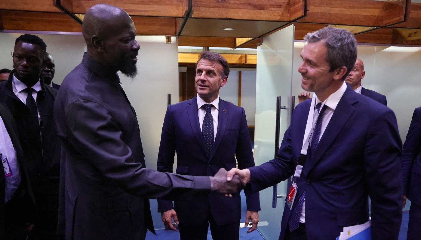 Emmanuel Macron's advisor for Africa, Jérémie Robert, shakes hands with Guinean President Mamadi Doumbouya in Nairobi on May 12, 2026.