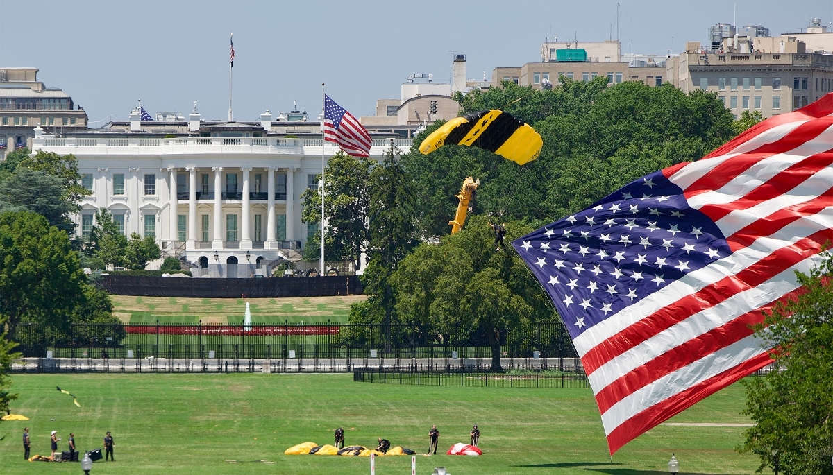 Members of the US Army land with a giant US flag near the White House in Washington, 4 July 2026.
