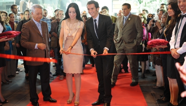 Salwa Idrissi Akhannouch (centre) opens a Fnac store at Morocco Mall in 2011, flanked by Casablanca Mayor Mohamed Sajid (far left) and Fnac CEO Alexandre Bompard (right).