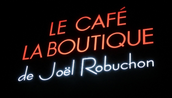 A sign for the Joël Robuchon brand in Tokyo, 2022.