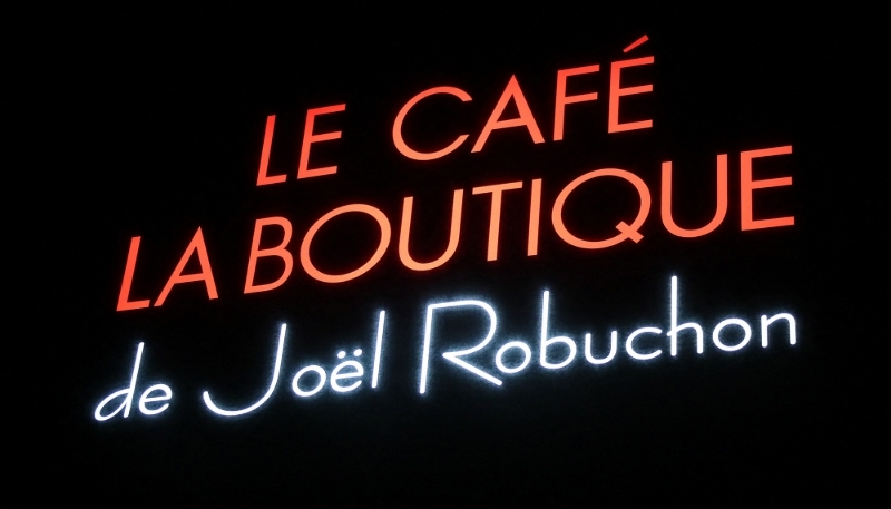 A sign for the Joël Robuchon brand in Tokyo, 2022.