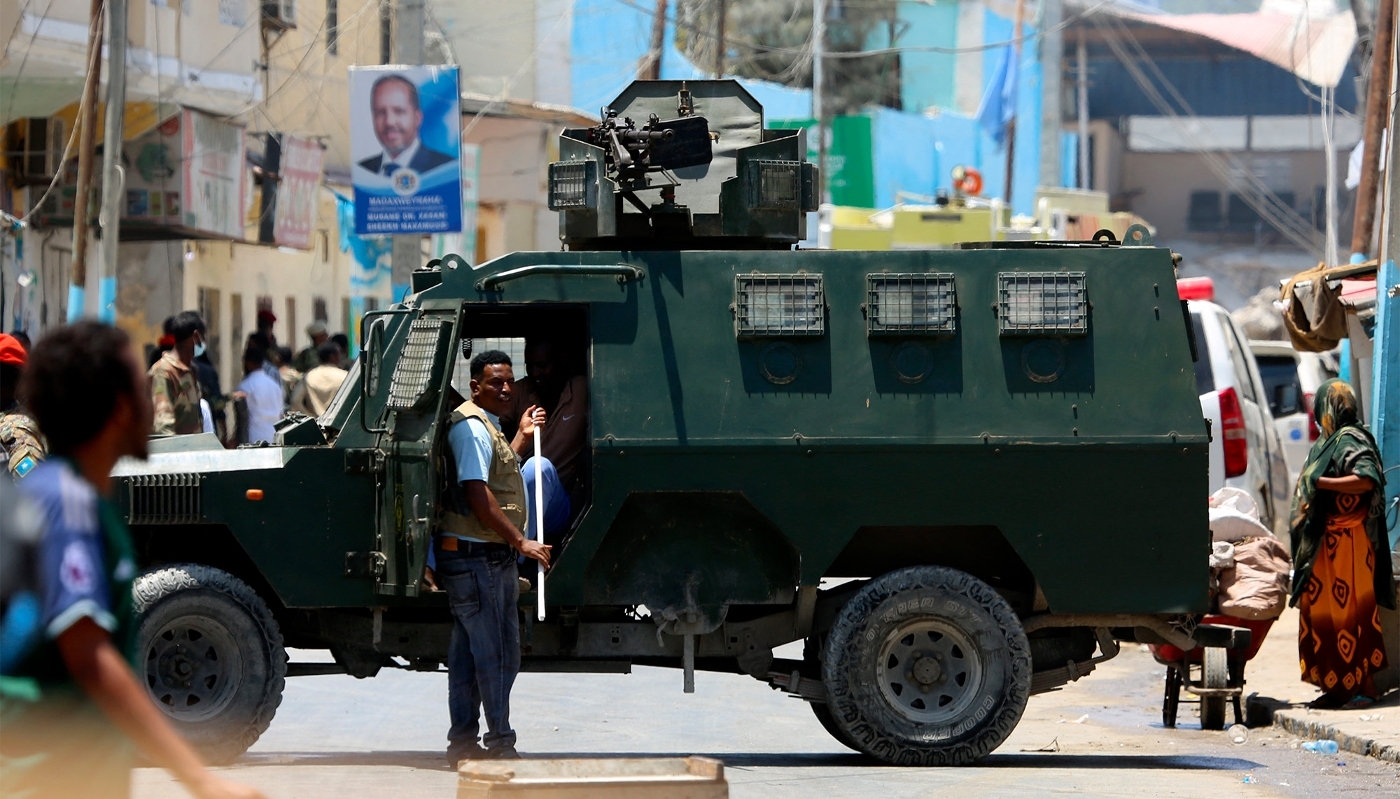Security forces are dispatched to the scene following a bomb attack launched against the president's convoy in Mogadishu on 18 March 2025.