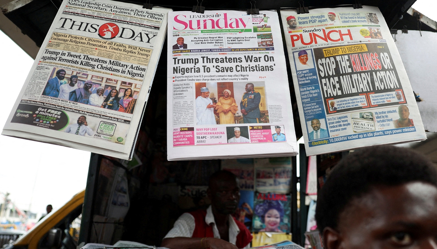 Newspapers reporting US President Donald Trump's message to Nigeria, in Ojuelegba, Lagos, 2 November 2025.