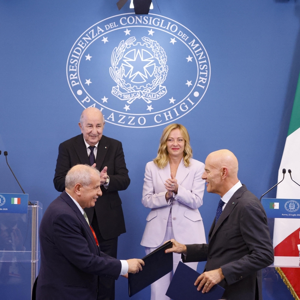 Rachid Hachichi (bottom left), then CEO of Sonatrach, and Claudio Descalzi sign an MoU with Abdelmadjid Tebboune and Giorgia Meloni in attendance, in Rome on 23 July 2025.