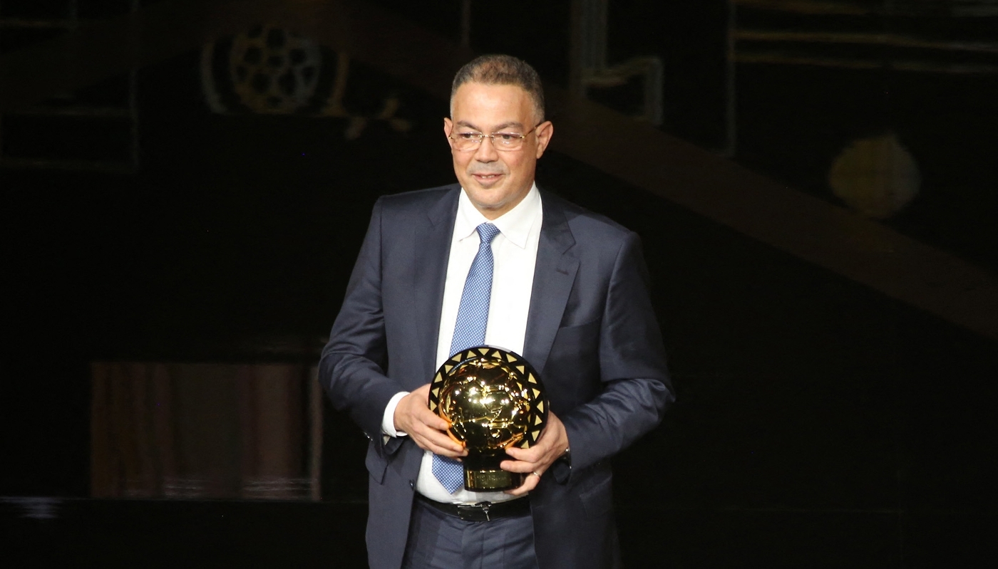 Fouzi Lekjaâ receives the Best Team Award at the 2023 CAF Awards in Marrakesh, Morocco, 11 December 2023.