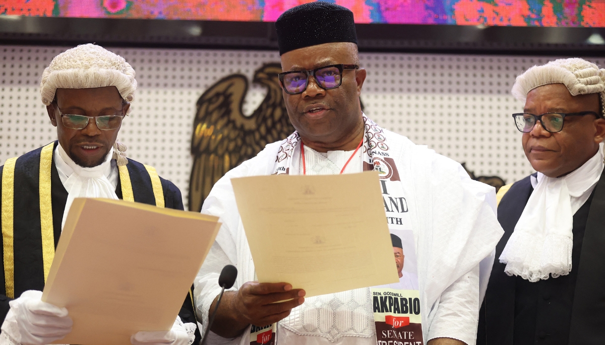 Nigeria's Senate president Godswill Akpabio (centre) takes the oath of office, Abuja, 13 June 2023.