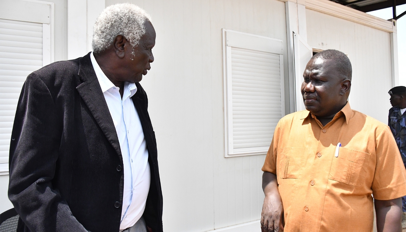 Abednego Akok Kacuol, former chairperson of the National Elections Commission with his successor Gabriel Bol Deng, in Juba, July 2025.