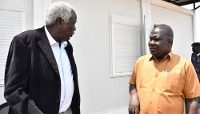 Abednego Akok Kacuol, former chairperson of the National Elections Commission with his successor Gabriel Bol Deng, in Juba, July 2025.