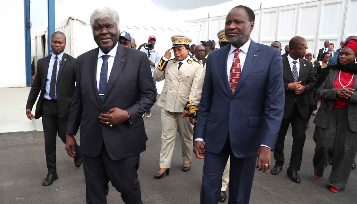 Prime Minister Robert Beugré Mambé (left) with the minister of mines and petroleum, Mamadou Sangafowa-Coulibaly, in Abidjan, June 2025.