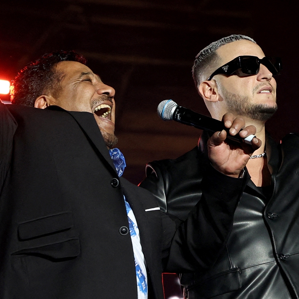 Algerian singer Cheb Khaled and Franco-Algerian DJ Snake in Doha, in December 2022.