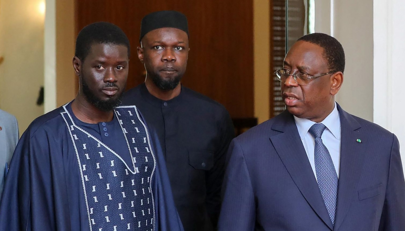 Macky Sall (right), Ousmane Sonko (center)and Bassirou Diomaye Faye (left), in Dakar on 28 March 2024.