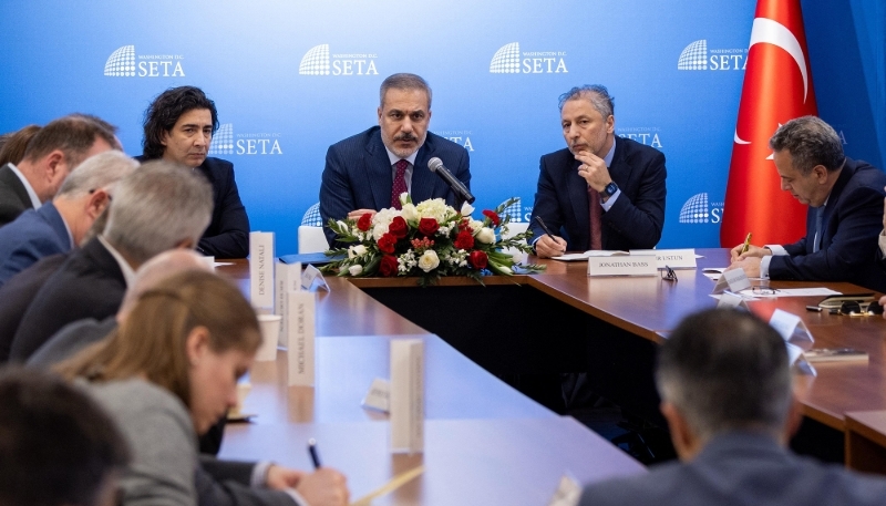 Turkish Foreign Minister Hakan Fidan (centre) in Washington, DC, on 26 March 2025.