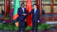 Zambian President Hakainde Hichilema and Wang Huning, chairman of the Chinese People's Political Consultative Conference (CCPPC), at the Forum on China-Africa Cooperation (FOCAC) in Beijing, on 5 September 2024. 