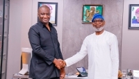 Jidayi Ijudigal (left) with Minister of Mines Henry Dele Alake in Abuja, June 2025.
