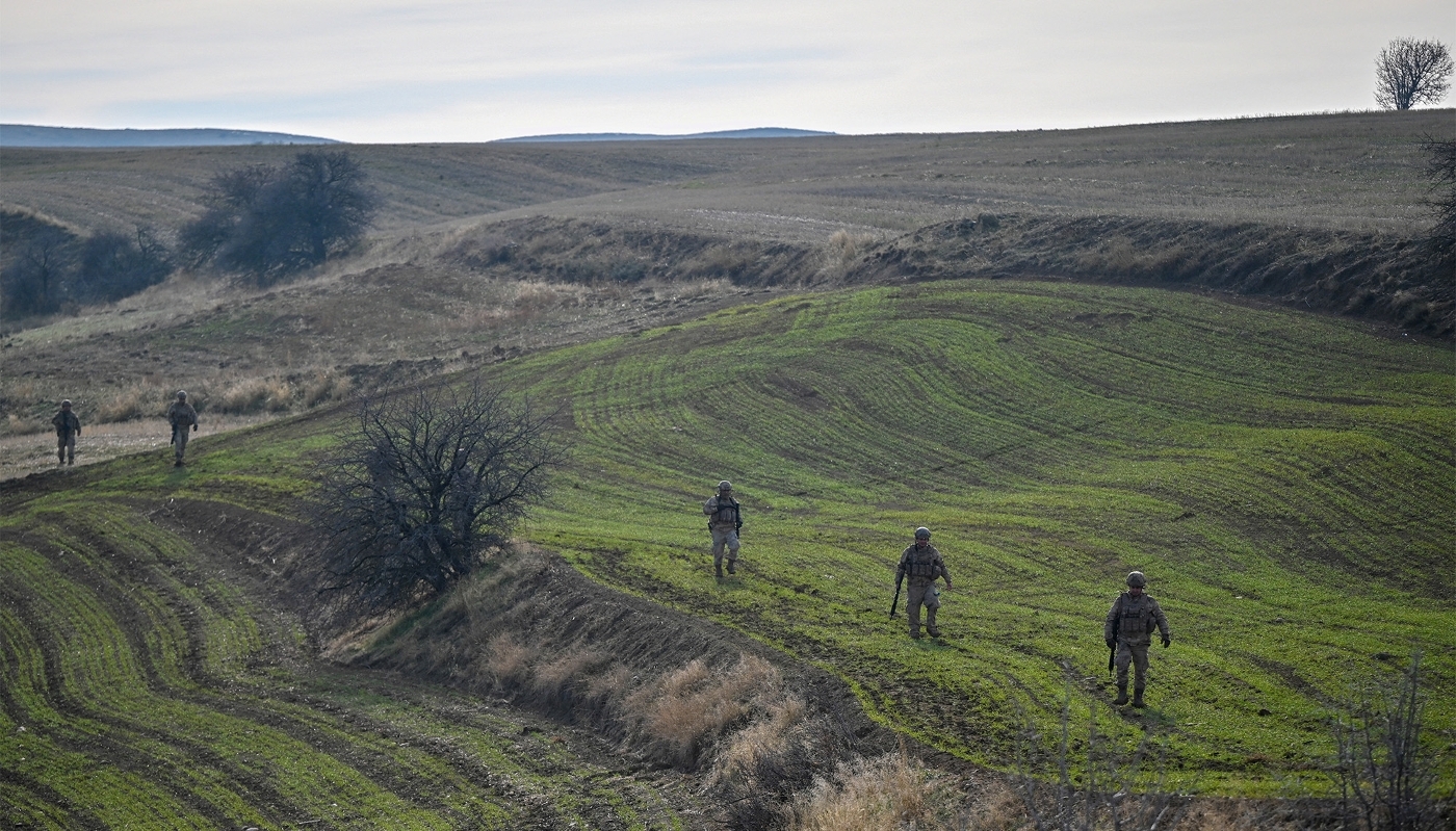 Turkish security forces secure the crash site near Kesikkavak, on 24 December 2025.