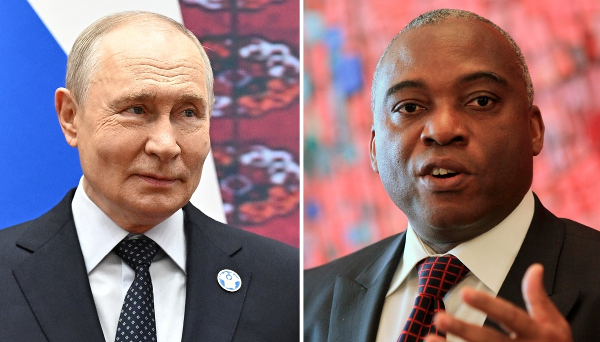 Russian President Vladimir Putin and Ahoua Don Mello, ex-Ivorian minister for public works under former president Laurent Gbagbo.