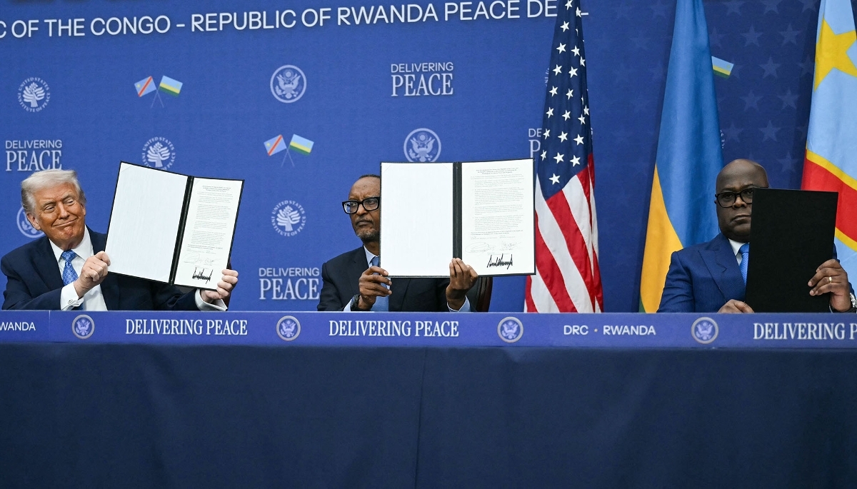 Donald Trump, Paul Kagame and Félix Tshisekedi during peace agreement signing between Rwanda and DRC in Washington DC, 4 December 2025.