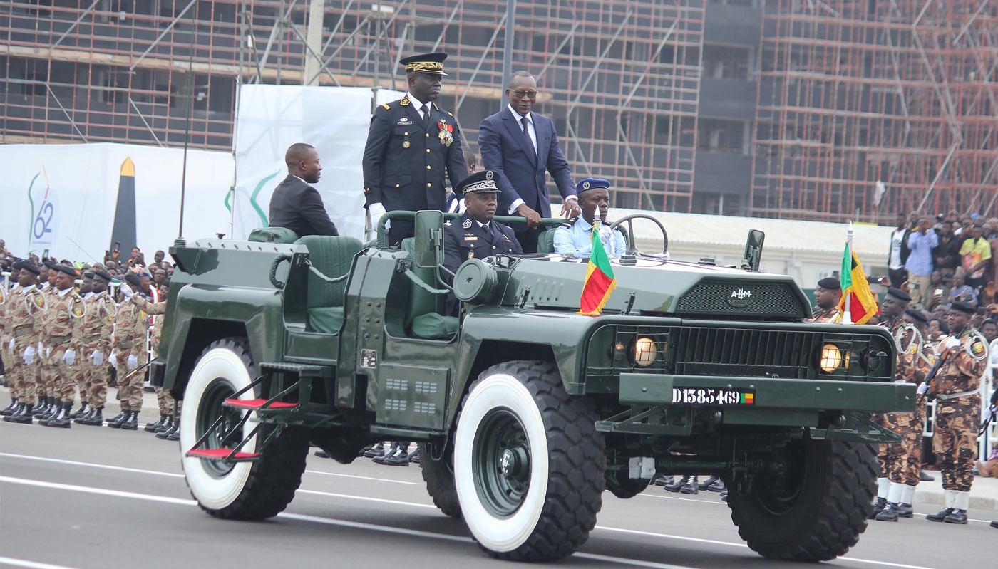 Beninese President Patrice Talon (right) being driven through Cotonou, in August 2022.