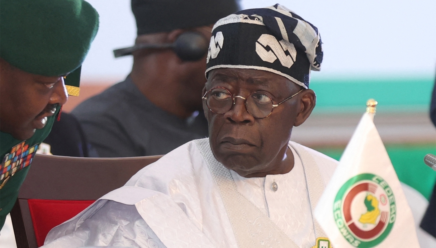 Nigerian president Bola Tinubu at the 64th Head of States and Government ordinary session in Abuja, 10 December 2023.