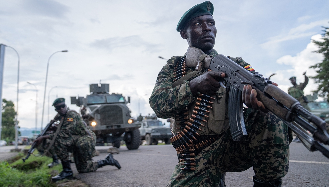 Members of the Ugandan People's Defence Forces (UPDF), positioned on the Ugandan side of the border town of Bunagana, in the DRC, in March 2023.