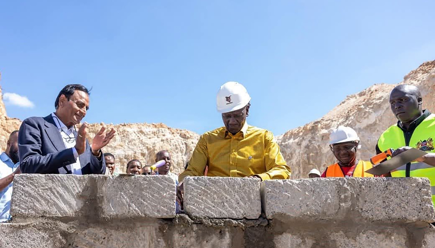 Narendra Raval (left) and William Ruto (centre) lay the foundation stone for the Devki Group's Kitui cement factory, in Kenya, on 27 October 2026.