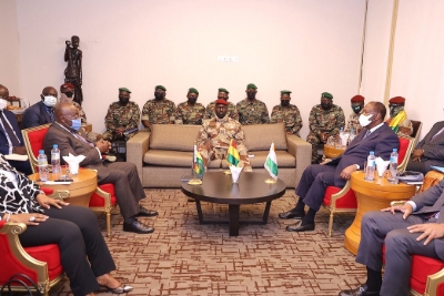 Ghanaian President Nana Akufo-Addo (left) and his Ivorian counterpart Alassane Ouattara (right) meet the putschists during an ECOWAS mission to Guinea on 17 September 2021.
