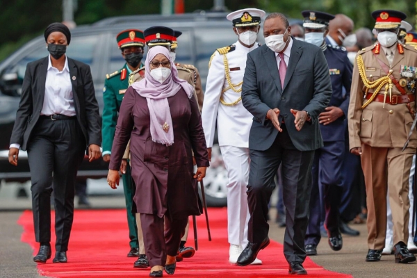 Tanzanian President Samia Suluhu Hassan with Kenya's President Uhuru Kenyatta.