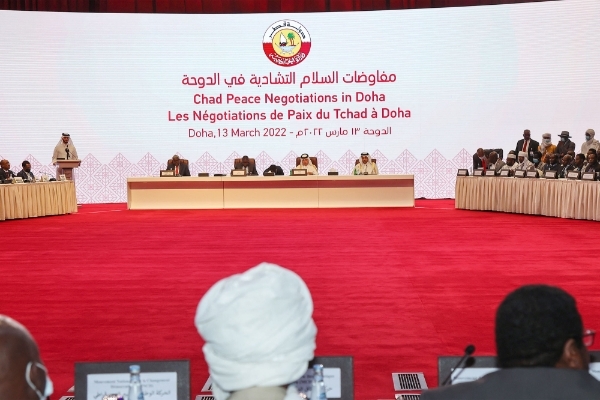 Participants take their seats at the start of the Chad Peace Negotiations in Doha, on 13 March 2022.