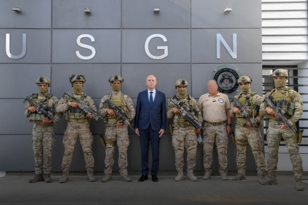 President Kais Saied with members of the special unit of the Tunisian National Guard, in Bir Bou Rekba (Nabeul state), in August 2021.