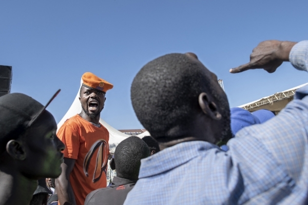 Supporters of Azimio la Umoja opposition coalition leader Raila Odinga react during his speech at a rally in Nairobi on 29 January 2023, in which he continued to denounce the results of the August 2022 presidential election.