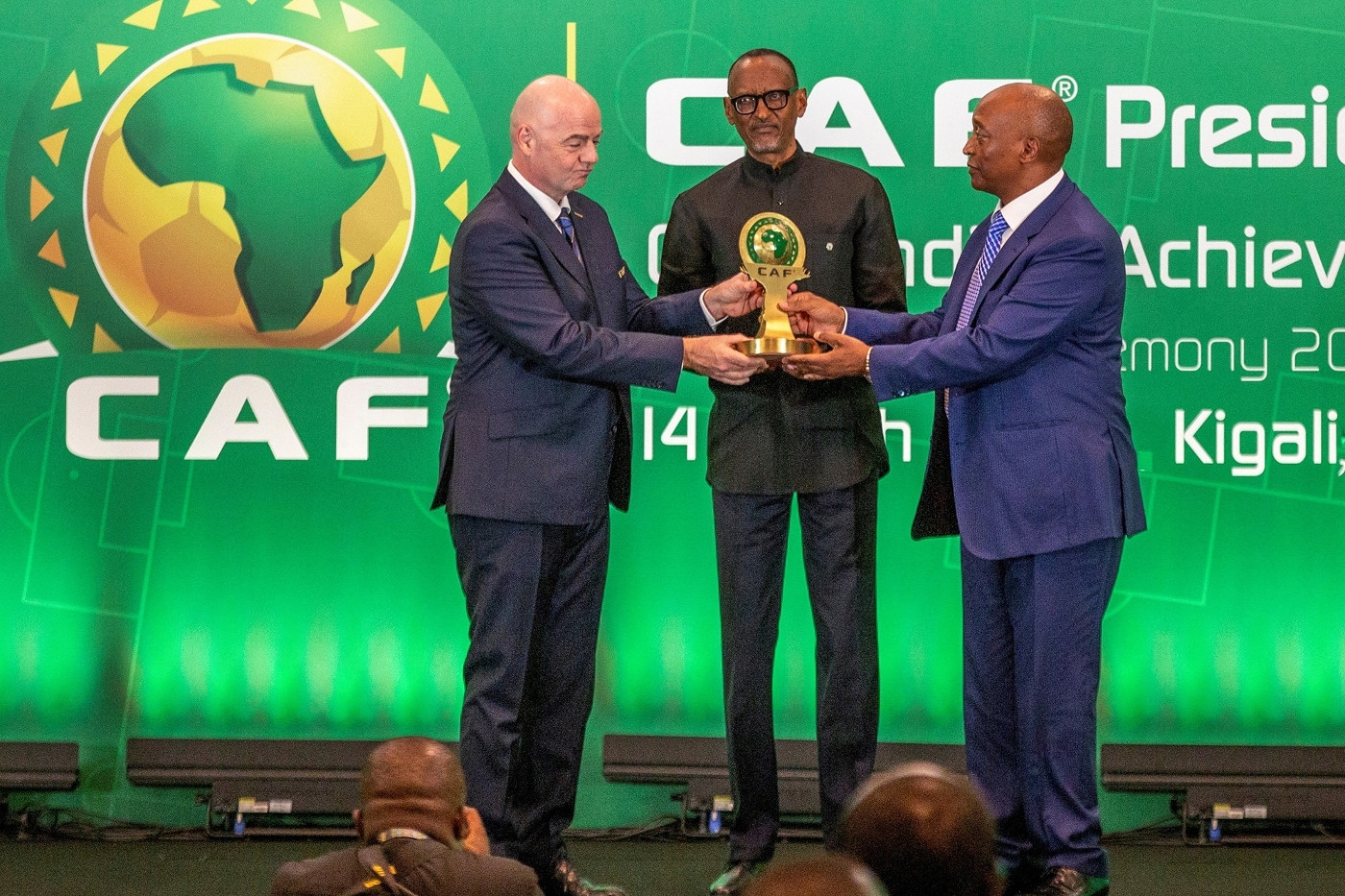 FIFA president Gianni Infantino, Rwandan president Paul Kagame and Confederation of African Football president Patrice Motsepe at the CAF President's Awards Ceremony in Kigali on 14 March 2023.