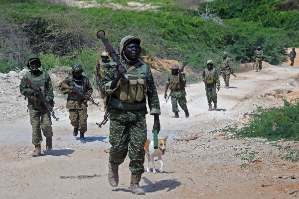 Uganda's troops, part of the African Union's military mission, patrol near the town of Merka, 90km south of Somalia's capital Mogadishu, on 17 July 2016.