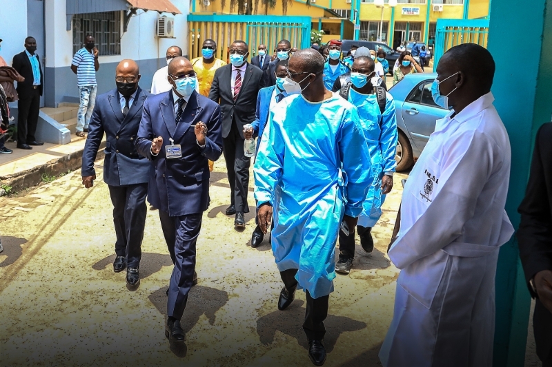 Cameroonian health minister Manaouda Malachie visits the Central Hospital as healthcare workers receive China's Sinopharm vaccines during the COVID-19 vaccination process in Yaounde on 12 April 2021.