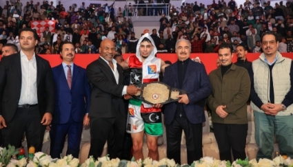 Boxer Saad Fathi Saad, with Mike Tyson, Khalifa Haftar and members of the Haftar family.