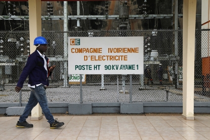 An employee of the Ivory Coast Electricity Company (CIE) at a hydroelectric dam station.