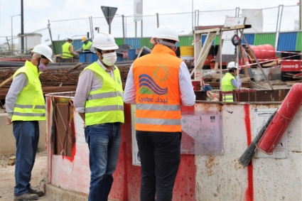 Technicians from Lydec, the private water and electricity operator in Casablanca, supervising the construction of a new city sewer in May 2020.