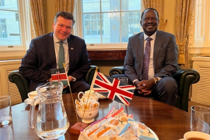 Kenyan presidential candidate Raila Odinga in the UK on 15 March 2022, here with UK Defence Secretary James Heappey (left).