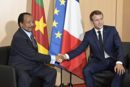 Cameroon's President Paul Biya (left) with his French counterpart Emmanuel Macron in Lyon in October 2019.