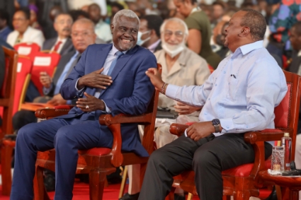 The chair of the African Union Commission Moussa Faki Mahamat (left) and the Kenyan president Uhuru Kenyatta at opening of the 9th Africities summit in Kisumu on 17 May 2022.