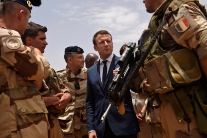 French president Emmanuel Macron visits the troops of France's Barkhane counter-terrorism operation in Africa's Sahel region in Gao, northern Mali, 19 May 2017.
