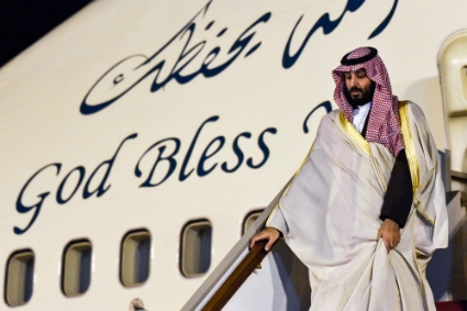 Saudi Crown Prince Mohammed bin Salman descends from his plane as he arrives at Algiers International Airport, southeast of the capital Algiers on December 2, 2018.
