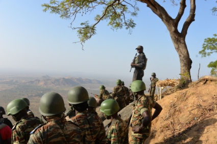 Cameroon's army forces patrol on 16 Febuary 2015 near the village of Mabass, northern Cameroon.