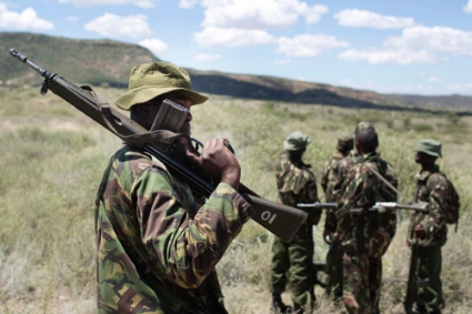 Kenyan police officers patrol in Turkana, on 15 November 2012.
