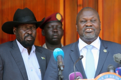 South Sudan's vice president Riek Machar flanked by President Salva Kiir at the State House in Juba, South Sudan, on 20 February 2020.