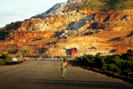 A Malagasy worker walks along an access track at mining giant Rio Tinto's mine in Fort Dauphin.